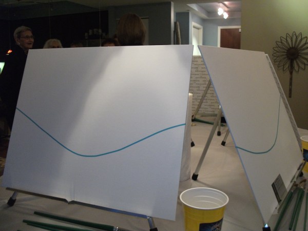 We "drew" our line with tape that separated the top from the bottom. separating the top from the bottom with tape. 