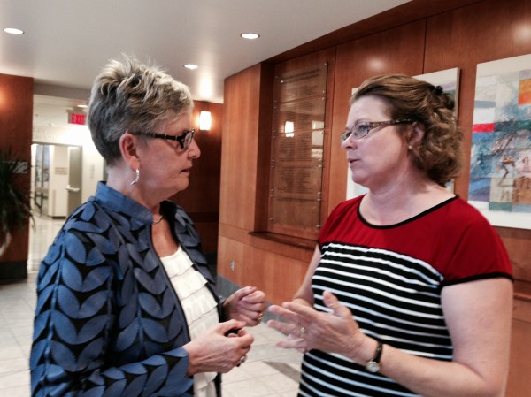 Chatting with former student, now faculty member